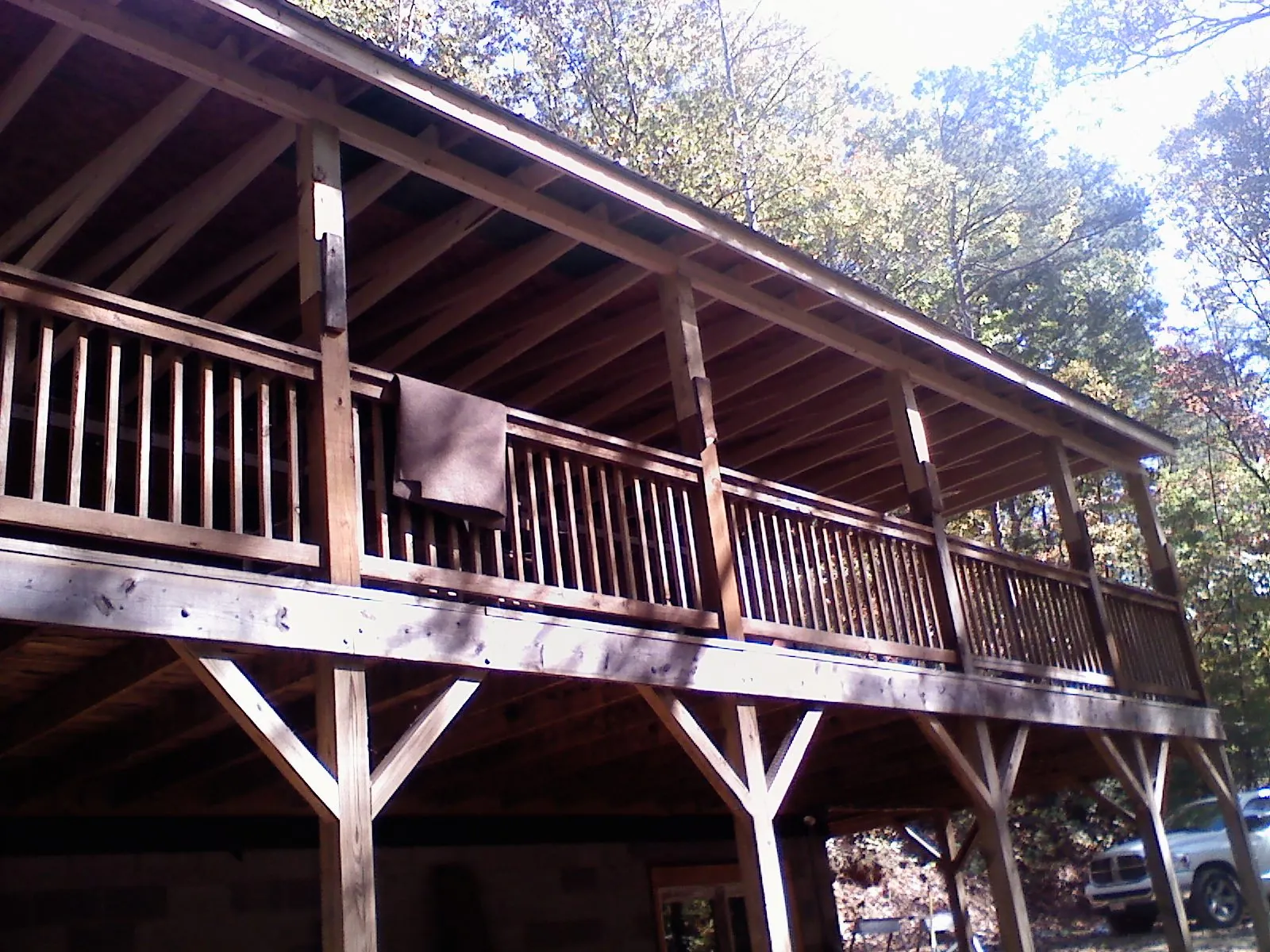 Timber framing under a new elevated porch and deck — Roof Leak Repair in Lenoir by Roofing Brothers